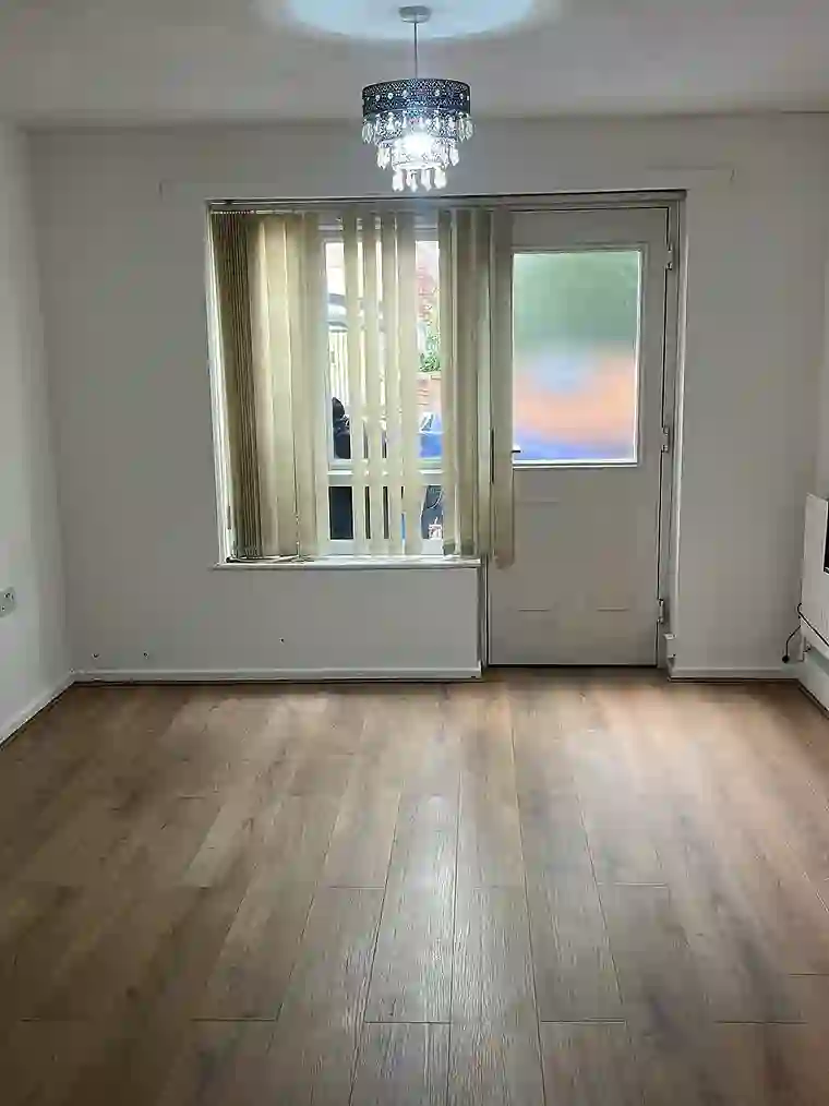 Floor restoration after — finished wood-laminate floor, by GTH Maintenance