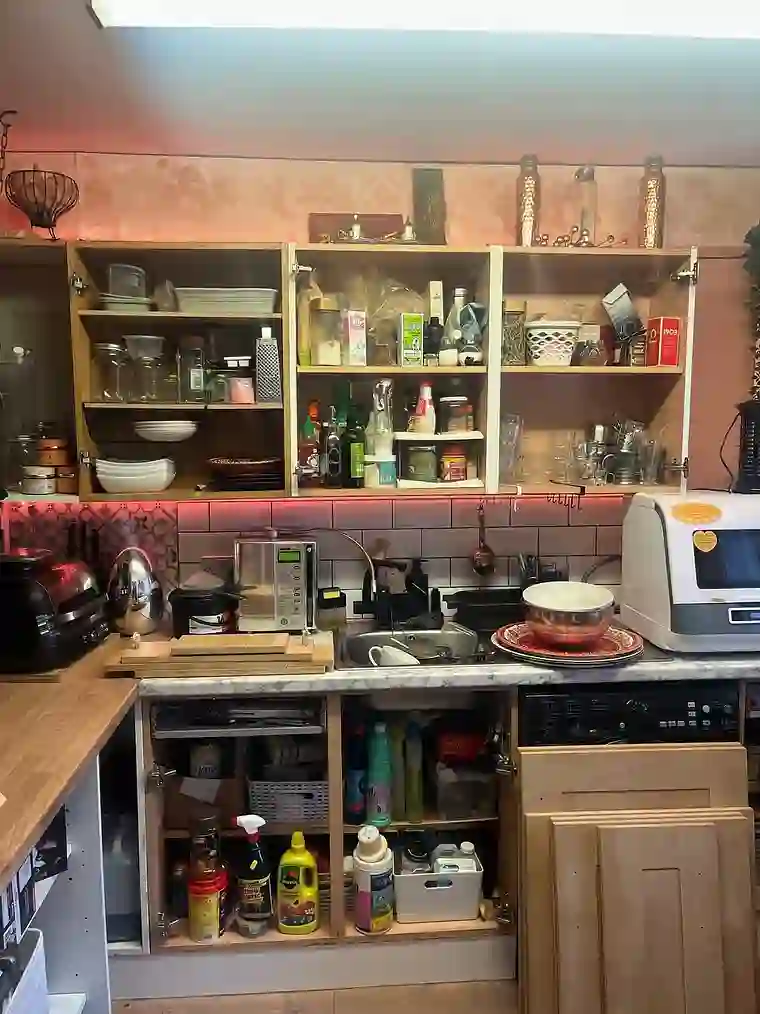 Kitchen renovation before — cluttered old kitchen, by GTH Maintenance Manchester